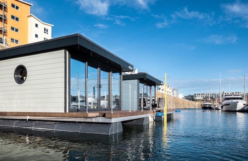 St. Helier Boat Rental | The Shells floating luxury apartments in St Helier Marina - a unique experience!