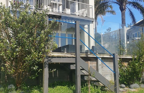 Gulf Harbour House | Fabulous and large 1 bedroom apartment with views over a perfect little lake