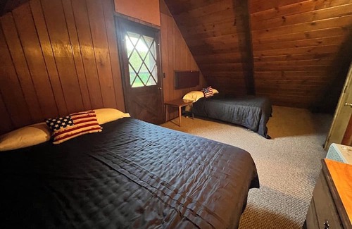 Cadillac Cabin | 3-bedroom cabin in charming Harrietta with WiFi. Perfect for a getaway.