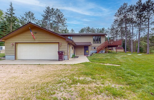 Hazelhurst House | Lakefront home with large patio, fire pit, air hockey & a provided peddle boat