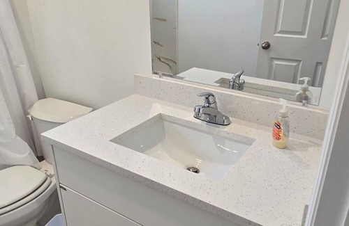 Palm Bay House | Cozy 4-bedroom house in tranquil Palm Bay with WiFi, AC. 30 minutes from beach.