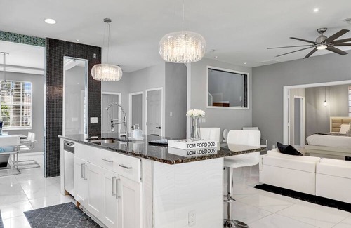 Biggar House | Gated Oasis: Luxurious 5-BR Retreat in Ft. Myers