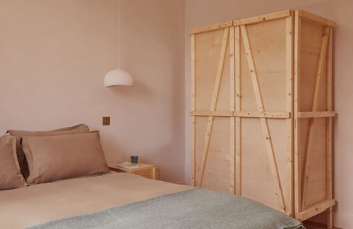 Ballycastle Apartment | Yarn - Honor is a spacious luxury suite king size bed, bathroom & living/kitchen