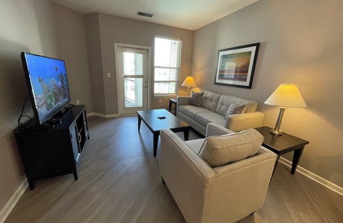 Polaris Apartment | Right at Polaris! 3rd floor w/elevator access and garage parking included!