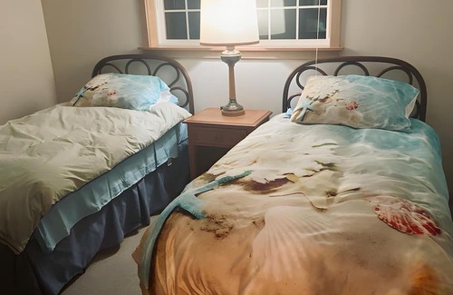 Burley House | Coastal Bliss: Your Dream Beachfront Getaway