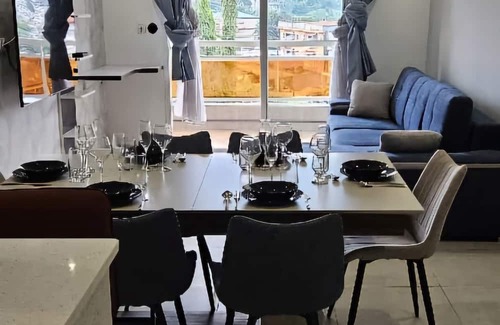 Deux Plateaux Apartment | Residence furniture over cloud open door to 2 plateau vallon