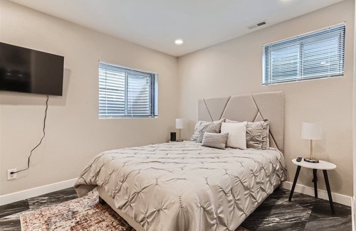 Aurora House | Chic, Modern and Cozy Basement with Garage