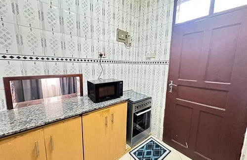 Dar es Salaam House | Unmatched Convenience: The Brownstone Provides Easy Access to Evrything You Need