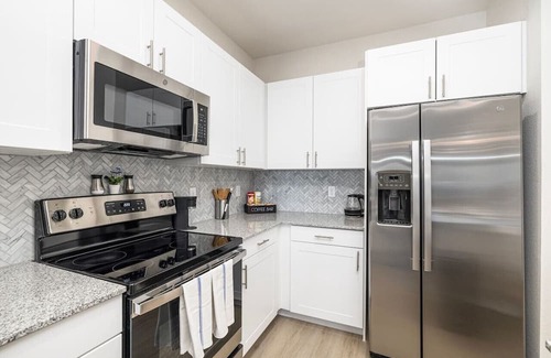 Lewisville Apartment | Stylish 1BD: Pool, Fitness & Workspace Oasis
