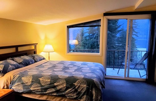 Eagle Bay Bed & Breakfast | Suite Retreat at the Lakehouse, with lake access and beautiful lake views.