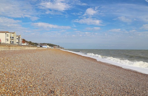 Sandgate Cottage | Relax on your balcony and enjoy the stunning, far reaching sea views overlooking Sandgate Bay.