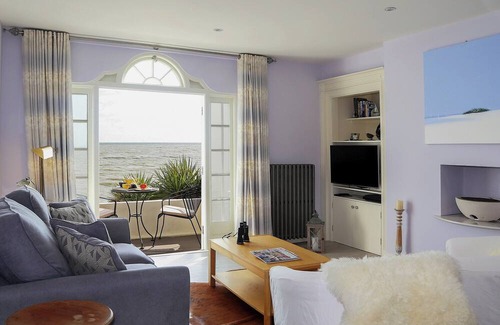 Sandgate Cottage | Relax on your balcony and enjoy the stunning, far reaching sea views overlooking Sandgate Bay.