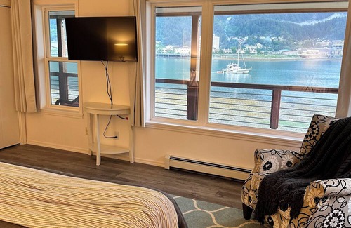 Juneau House | Spacious beachfront retreat with views of Gastineau Channel and downtown Juneau.