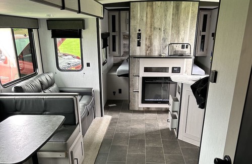 Mosinee House | Waterside Campsite with camper. Pet friendly!