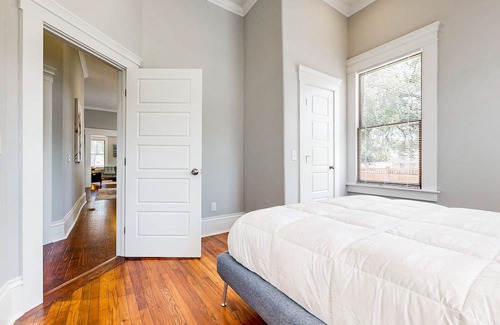 Metropolitan House | Dog-friendly duplex with front porch, fenced yard & walkable location