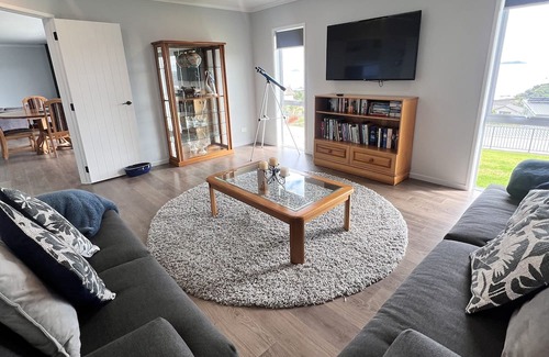 Cable Bay House | Above The Rest is positioned perfect with a view across the bay.