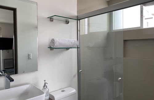Carmen Apartment | Habitación con Baño Privado y Estacionamiento