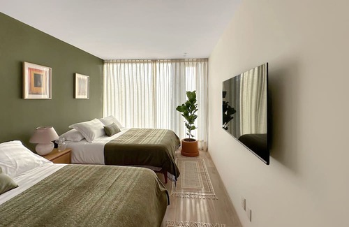 San Miguel Chapultepec Condo | Charming Condesa Gem: Cozy, Views & Luxe Amenities
