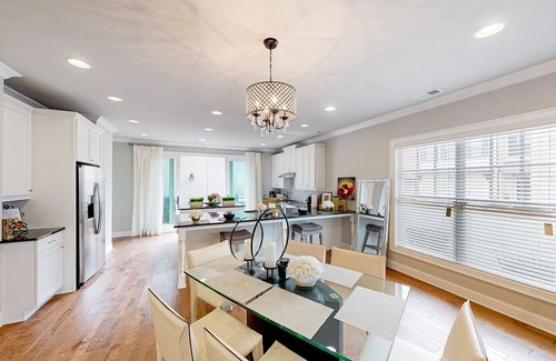 Roswell House | Peaceful & sun-filled getaway with courtyard, grill, games, & lovely fireplace