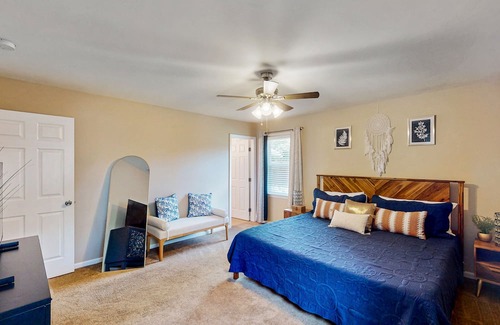 Isle of Hope Historic District House | Updated dog-friendly home with screened porch, children's items, & pellet grill