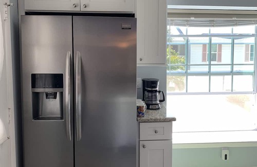 Capri Isle House | Charming townhome condo in a quiet Isle of Capri community.