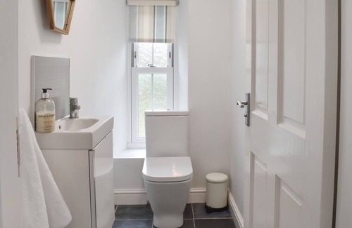 Arnside Cottage | Belmont Apartment seamlessly combines modern comfort with timeless charm, providing a tranquil sanct