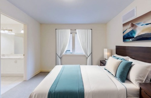 Brampton House | Modern 4-Bedroom Home with Serene Backyard Oasis