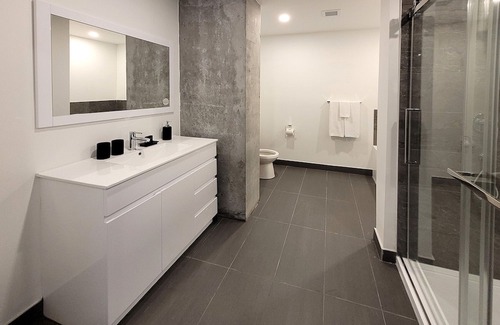 Fabreville Apartment | Corporate Stays -Relax & unwind with 1BR exclusive amenities with Rooftop Access