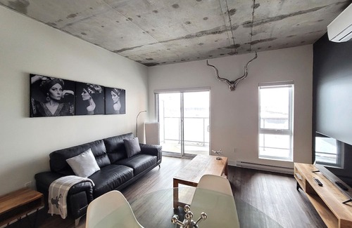 Fabreville Apartment | Corporate Stays -Relax & unwind with 1BR exclusive amenities with Rooftop Access