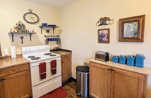 Davis Cabin | The Doll House - beautifully decorated cabin for up to four guests