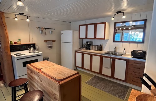 Saint Ferreol les Neiges Cabin | Charming riverside cottage