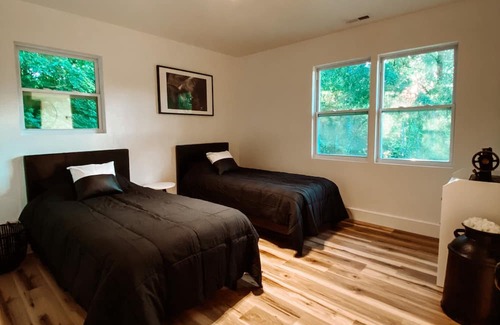 Matthews Cabin | Black and White Cabin on Tranquil Three Acres