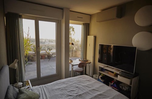 Combat Apartment | Rooftop, panoramic view of Paris.