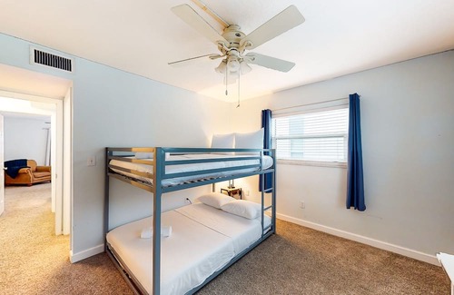 Capri Isle House | Renovated, waterfront townhome with pool & dock - walk to the beach
