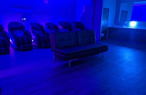 Indianapolis Apartment | Beds Are Overrated. Choose Luxury Massage Chairs. A 1 of a Kind Experience.