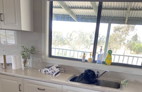 Beaufort House | Country serenity on seven acres. Full wrap around verandah for sunset drinks.