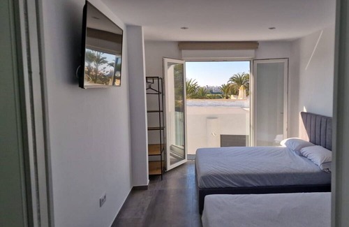 Almerimar House | Holiday Home 'Apartamento Gaviota 7' with Shared Terrace, Wi-Fi and Air Conditioning