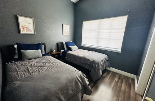 Sunrise Manor House | Enjoy the view of the entire city while playing mini golf in the patio.