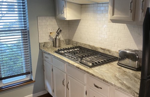 CUF Condo | Two-Story Luxurious Condo with Deck and Amazing City Views Close to the Action