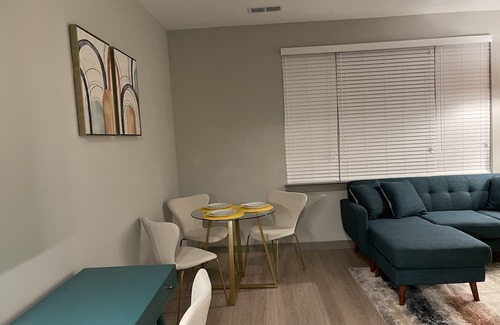 Town Center Apartment | Yellow Serenity: A perfect balance of serenity with nearby entertainment.