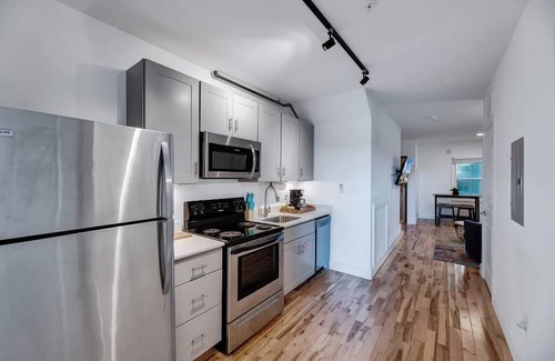 Wilson Apartment | The Whirlistay- family friendly, downtown Wilson, next to the whirligigs!
