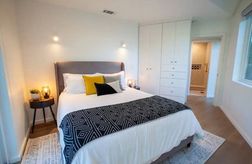 North Loop House | Stylish 3 story house. 3 patios. Central Austin.