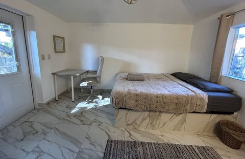 West Little River Apartment | Cozy Cabin with private fenced garden in Miami. Kick back and relax here.