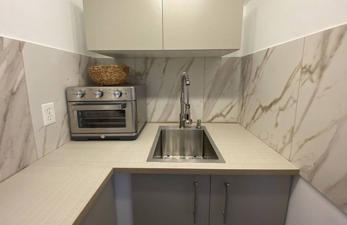 West Little River Apartment | Cozy Cabin with private fenced garden in Miami. Kick back and relax here.