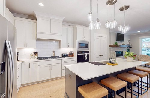 Apex House | Art-filled home near downtown with open layout & fireplace - dog-friendly