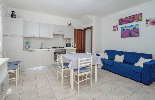 Schifoni Villa | Villa 'Villetta Budoni Lutturai' with Sea View, Private Terrace and Air Conditioning