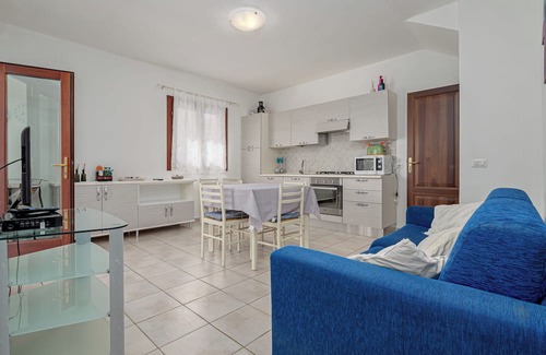 Schifoni Villa | Villa 'Villetta Budoni Lutturai' with Sea View, Private Terrace and Air Conditioning