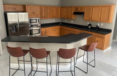 Legacy Park House | Spacious 4BD 3.5BR Home 10 minutes from all Disney attractions