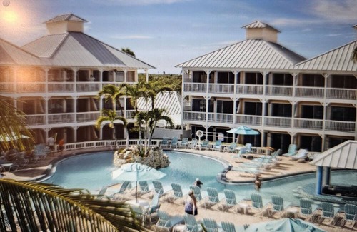 Colliers Bay Condo | Morritt's Tortuga Club :Three pools , lovely beach and pier. 2Bd/2Bth.