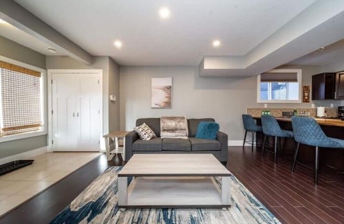 St. Albert House | Beautiful walkout basement suite with floor to ceiling windows and a great view